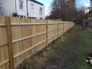 new close board fencing with wooden posts and gravel boards in Dulwich, work by South London Fencing